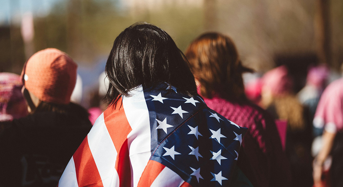 American wrapped in a US flag. American wrapped in a US flag.