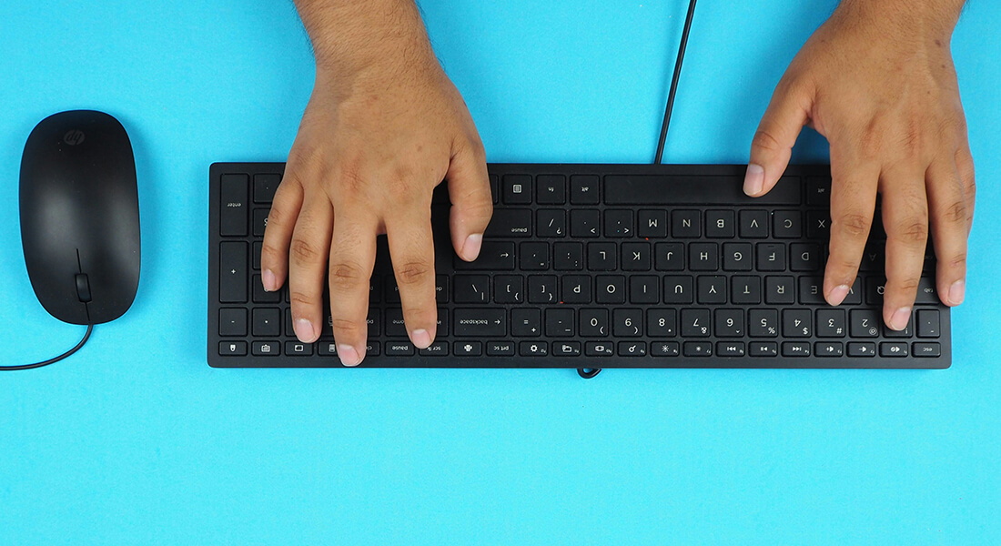 Hands by a keyboard. Hands by a keyboard.