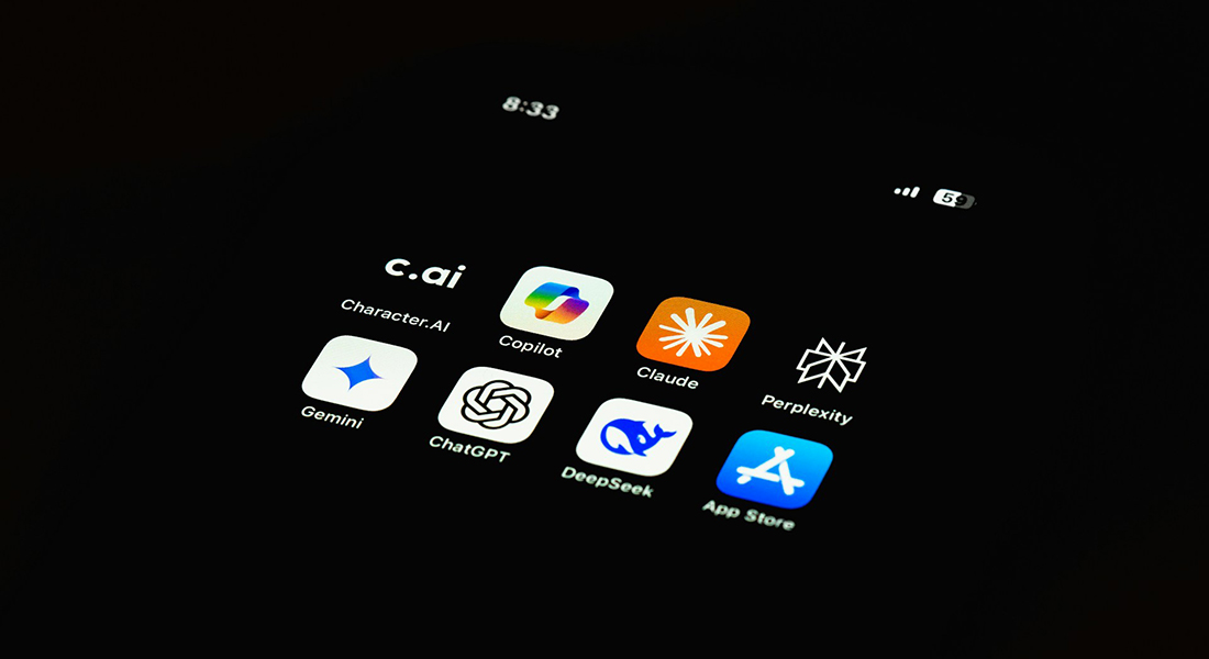 Smartphone with AI app icons.